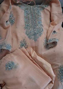 light peach coloure suit