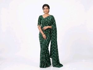Elegant Black Saree with Heart Motifs