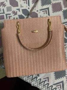 Chic Pink Textured Handbag