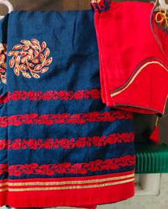 Elegant Blue Saree with Red Embroidery desig