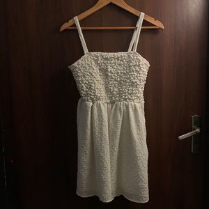 white ruffled mini dress