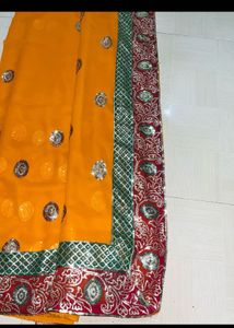 Yellow Georgette Saree with Intricate Gota Patti a