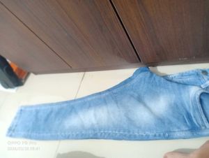 Stylish Light Wash Denim Jeans with Unique Patch D
