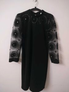 Elegant Black Dress with Sheer Embellished Sleeves