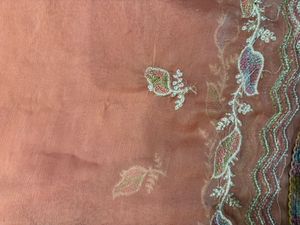an elegant, cream-toned traditional Indian Kurta