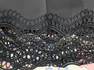 Chic Black Dress with Lace Hem