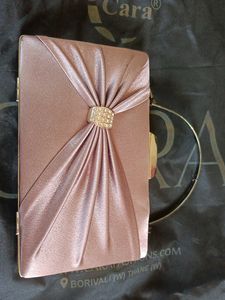 Elegant Rose Gold Clutch with Rhinestone Detail
