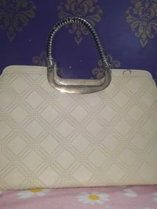 Chic Off-White Textured Handbag