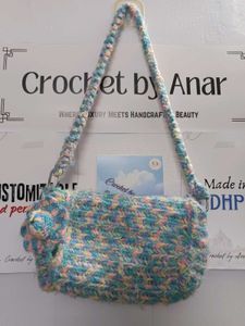 Crochet shoulder bow bag with mini hat tassel