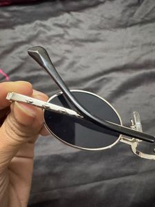voyage black oval unisex sunglasses