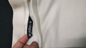 Off-white Short Top For Casual Wear.