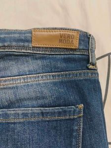 Distressed Blue Denim Jeans