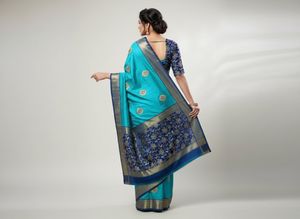 Beautiful Turquoise Saree with Gold Embroidery