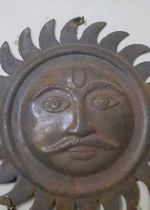 antique sun face decorative wall hanging with bell
