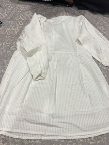 White Textured Dress with Pink Bow