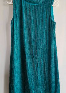 Chic Teal Sleeveless Mini Dress sequence
