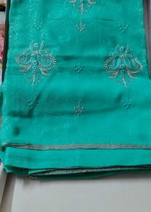 Elegant Turquoise Embroidered Saree