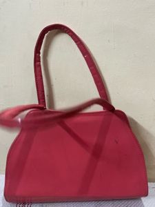 Red Handbag with Embellishments