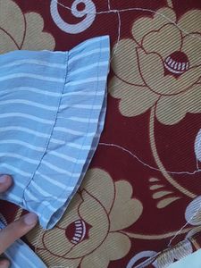 A S Size Ginger Top With Grey And White Stripes.