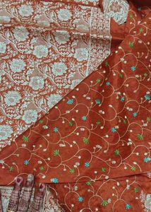 Elegant Orange Embroidered Saree