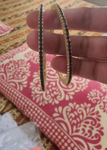 Elegant Gold Bangles with Blue Stones
