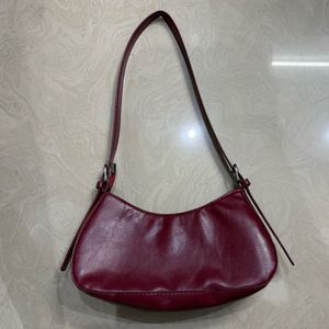 Stylish Burgundy Hobo Bag with Buckles