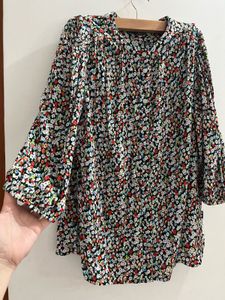 Marks and Spencer Floral Print Button-Up Tunic.