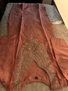 Elegant Pink Kurta Set with Intricate Embroidery