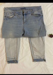 Distressed Light Wash Denim Jeans