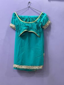Teal Saree with Pearl Detailing