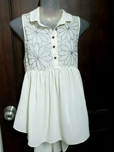 Cream Sleeveless Floral Top