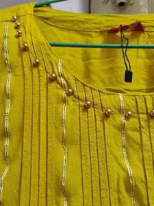 Stylish Yellow Kurta with Embellishments