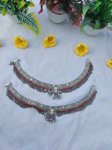 Intricate Anklets with Red Beads