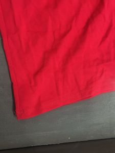 Red Wide-Leg Pants with Bold White Text