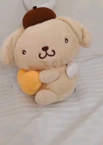 Sanrio Angel Pompompurin  holding a smalll