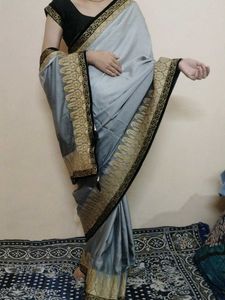 Elegant Grey Saree with Gold Border