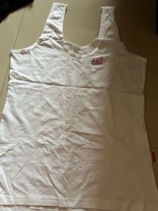 Cute White Camisole with Flower Detail