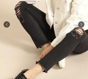 Distressed Black Denim Jeans