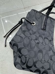 Coach Black Signature Stripe Handbag
