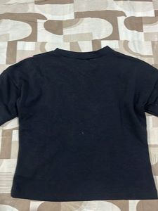 Stylish Black Top with Pink and White V-Neck