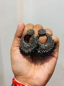 Oxidized Silver Jhumka Earrings with Green Beads