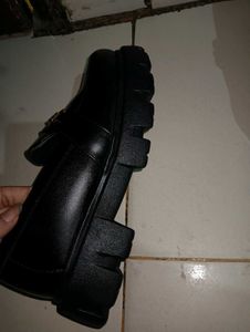 Black Loafers with Gold Detail