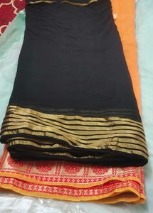 soft golden zari border georgette