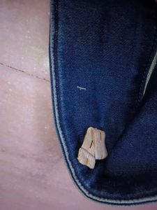 Stylish Blue Denim Capris with Orange Accents