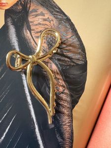H&amp;M Gold Bow Hair Clip