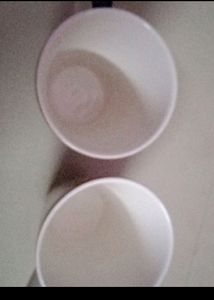 A PAIR OF ELEPHANT DESIGNED MUGS NEW