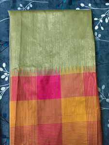 Elegant Gold Saree with detailed pink orange skirt