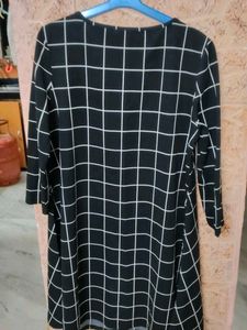 SHEIN Black checkered A-line dress.