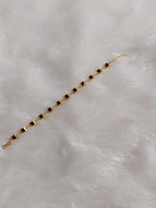 Elegant Bracelet with Black Stone Details