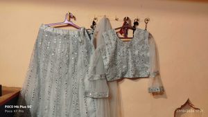 Stunning Sequined Grey Lehenga choli with dupatta.